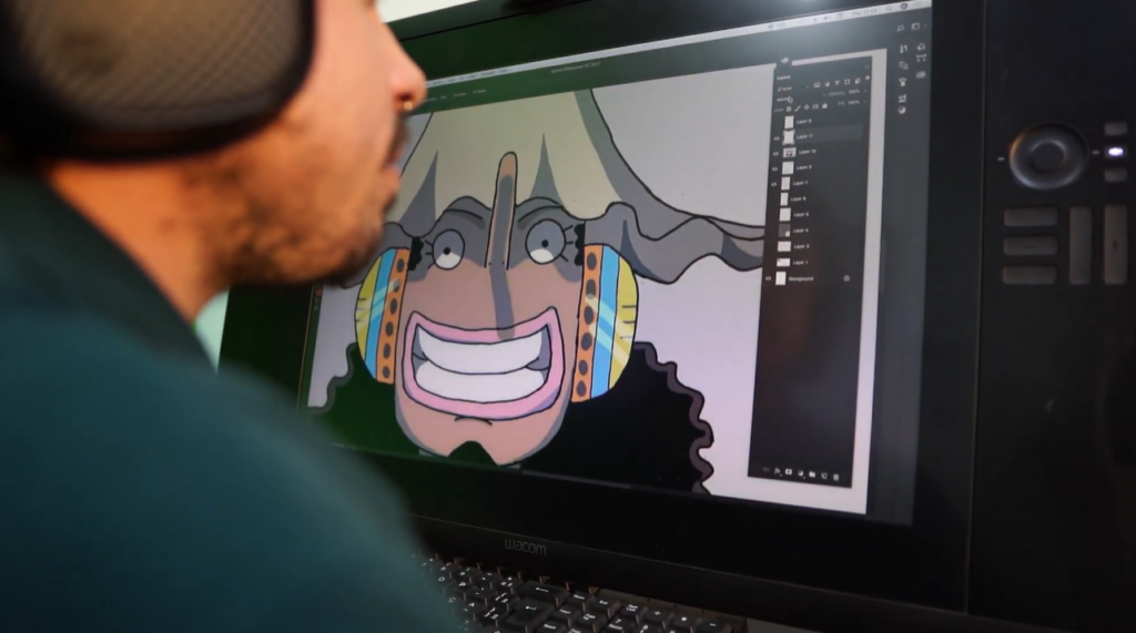 Aula de Desenho Digital - Professor João corrigindo as atividades dos alunos.
